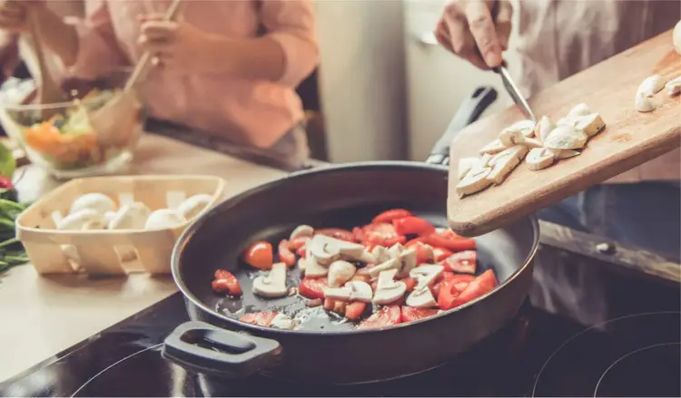 Cooking homemade vegetarian mushroom pasta sauce