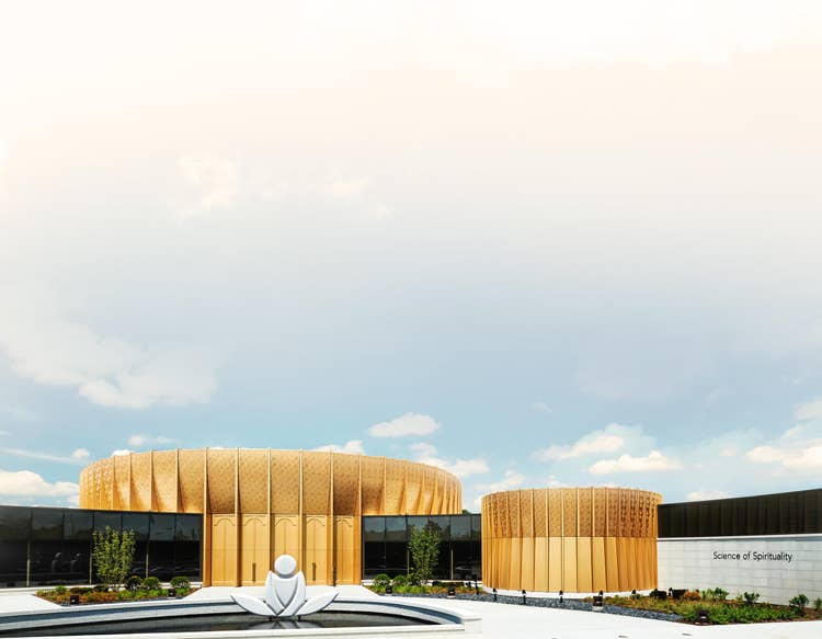 The golden-domed Science of Spirituality International Meditation Center in Lisle, Illinois, with its lotus fountain and reflecting pool