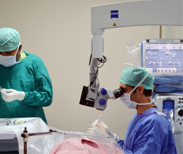 Doctors examining patients at the free eye checkup camp